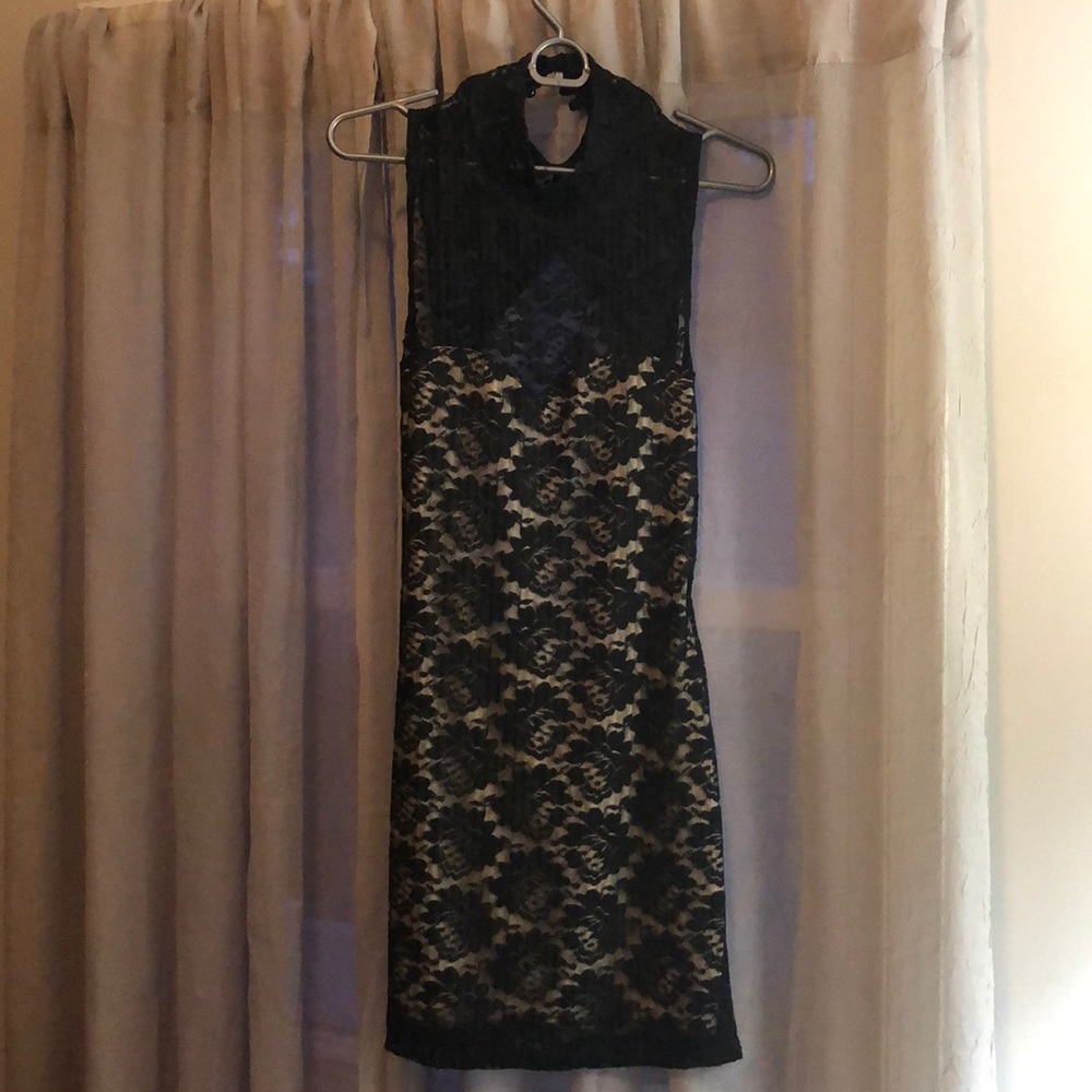 Black lace cocktail dress with nude lining
